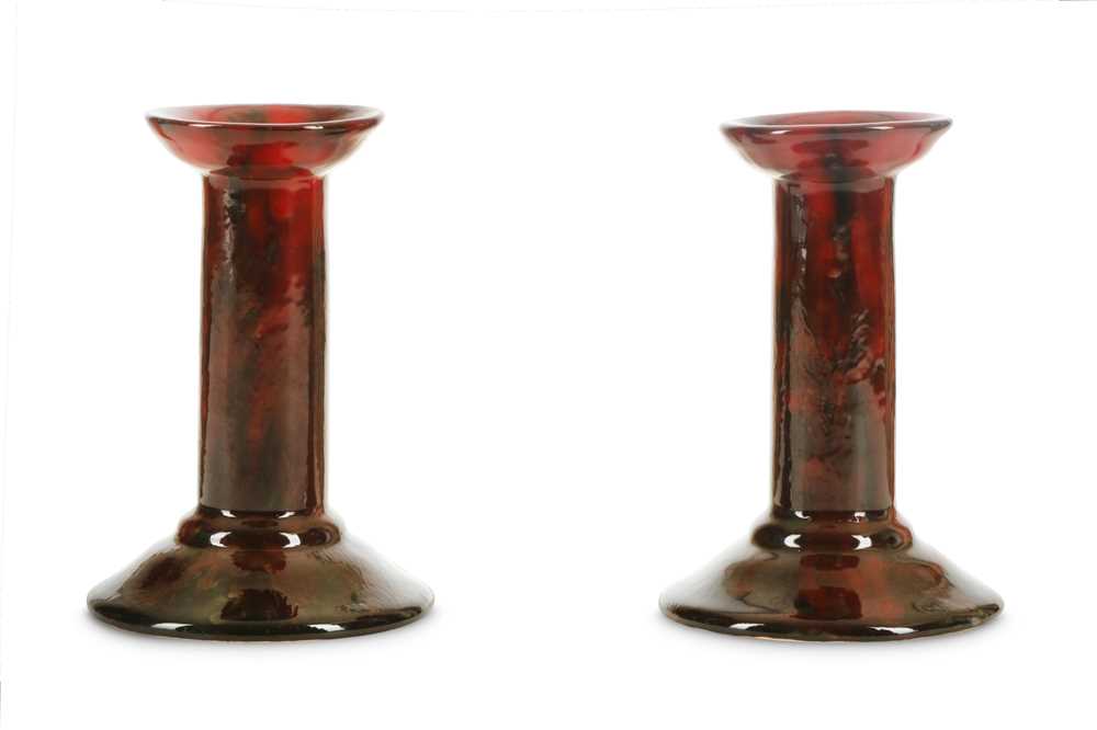 Lot 198 - A RARE PAIR OF ROYAL DOULTON SUNG CANDLESTICKS...