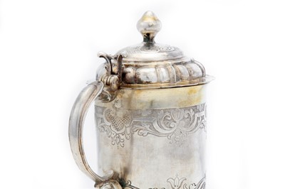 Lot 126 - A 18th century German parcel-gilt tankard,...