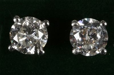 Lot 485 - A pair of 18ct white gold and diamond stud...