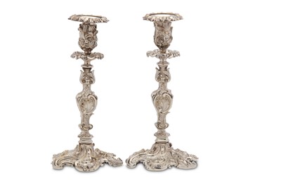 Lot 205 - A pair of Victorian silver-plated candlesticks,...
