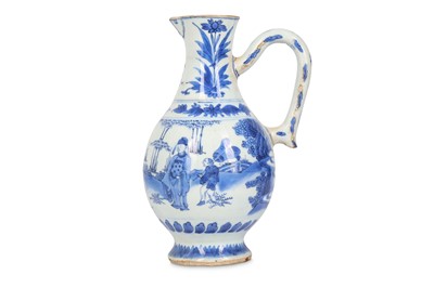 Lot 307 - A CHINESE BLUE AND WHITE JUG.  Transitional...