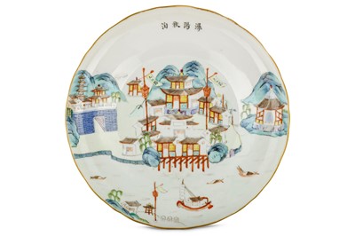 Lot 217 - A CHINESE FAMILLE ROSE 'WATERSIDE SCENE' DISH....