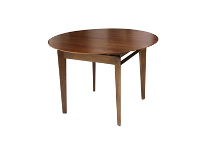 Lot 747 - A 1950s Italian extending walnut dining table,...