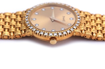 Lot 327 - PIAGET. A LADIES 18K YELLOW GOLD AND DIAMOND...