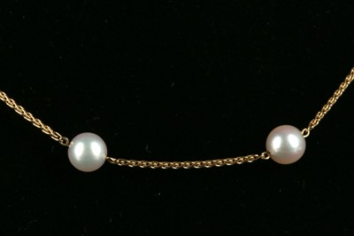 Lot 511 - An 18ct and cultured rose pearl necklace.