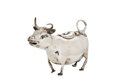 Lot 102 - A late 19th century German silver cow creamer,...