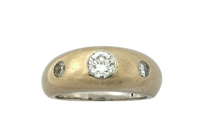 Lot 83 - A diamond three-stone ring, by Theo Fennell,...