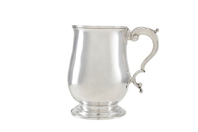 Lot 224 - A George III sterling silver mug, London 1778...