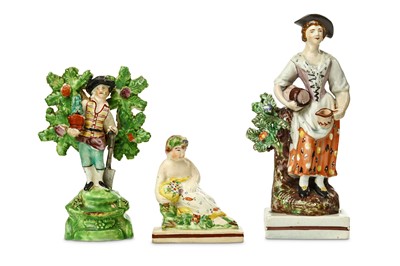 Lot 107 - THREE STAFFORDSHIRE POTTERY FIGURES, early...