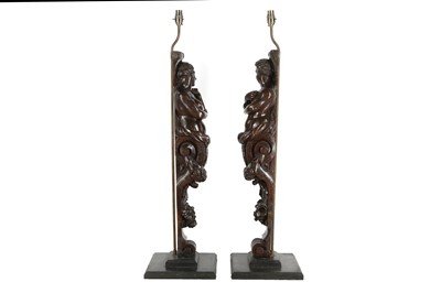 Lot 170 - A PAIR OF 19TH CENTURY CARVED OAK CARYATID...