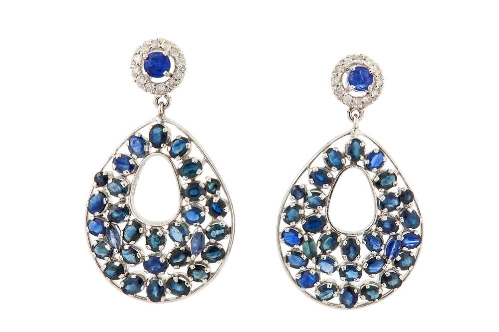 Lot 60 - A pair of sapphire and diamond pendent earrings