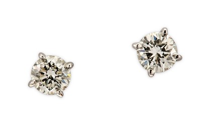 Lot 42 - A pair of diamond earstuds Each brilliant-cut...