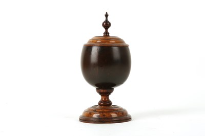 Lot 62 - A 19TH CENTURY COCONUT AND FRUITWOOD CUP AND...