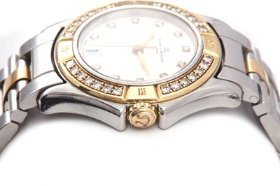 Lot 315 - BAUME & MERCIER. A LADIES STAINLESS STEEL...