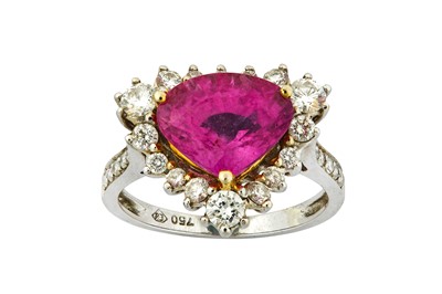 Lot 44 - A pink sapphire and diamond ring  The...