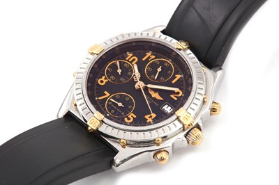 Lot 302 - BREITLING. A GENTS STAINLESS STEEL CALENDAR...