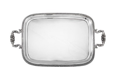 Lot 221 - A George V sterling silver twin handled tray,...