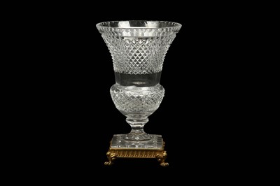 Lot 201 - AN EMPIRE STYLE CUT GLASS AND GILT-METAL...