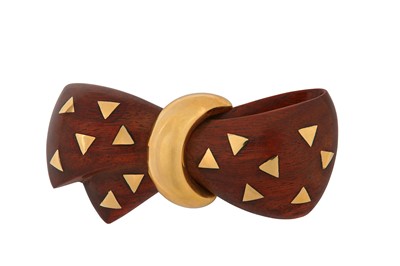 Lot 90 - A wood and gold brooch, by Van Cleef & Arpels,...