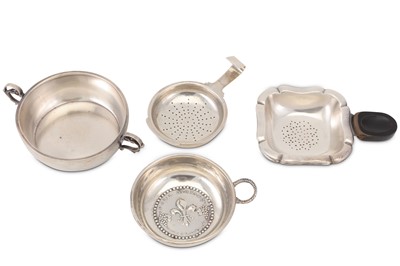 Lot 356 - A mixed group of silver tea strainers and wine...