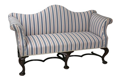 Lot 746 - A George II style sofa, with arch back and...