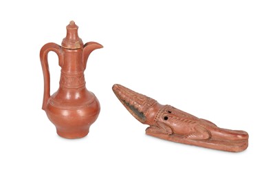 Lot 94 - AN EGYPTIAN TOPHANE POTTERY FOOT SCRATCHER AND...