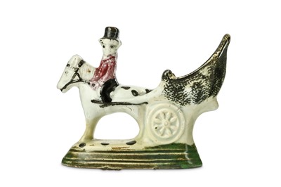Lot 106 - A RARE STAFFORDSHIRE POTTERY MODEL OF A...
