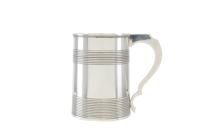 Lot 225 - A George III sterling silver mug, London 1800...