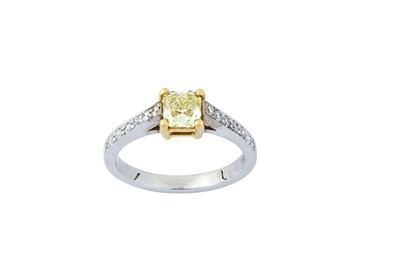 Lot 181 - A fancy-coloured diamond and diamond ring The...