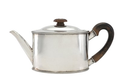 Lot 230 - A George III sterling silver teapot, London...