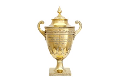 Lot 228 - An Edwardian sterling silver-gilt vase and...