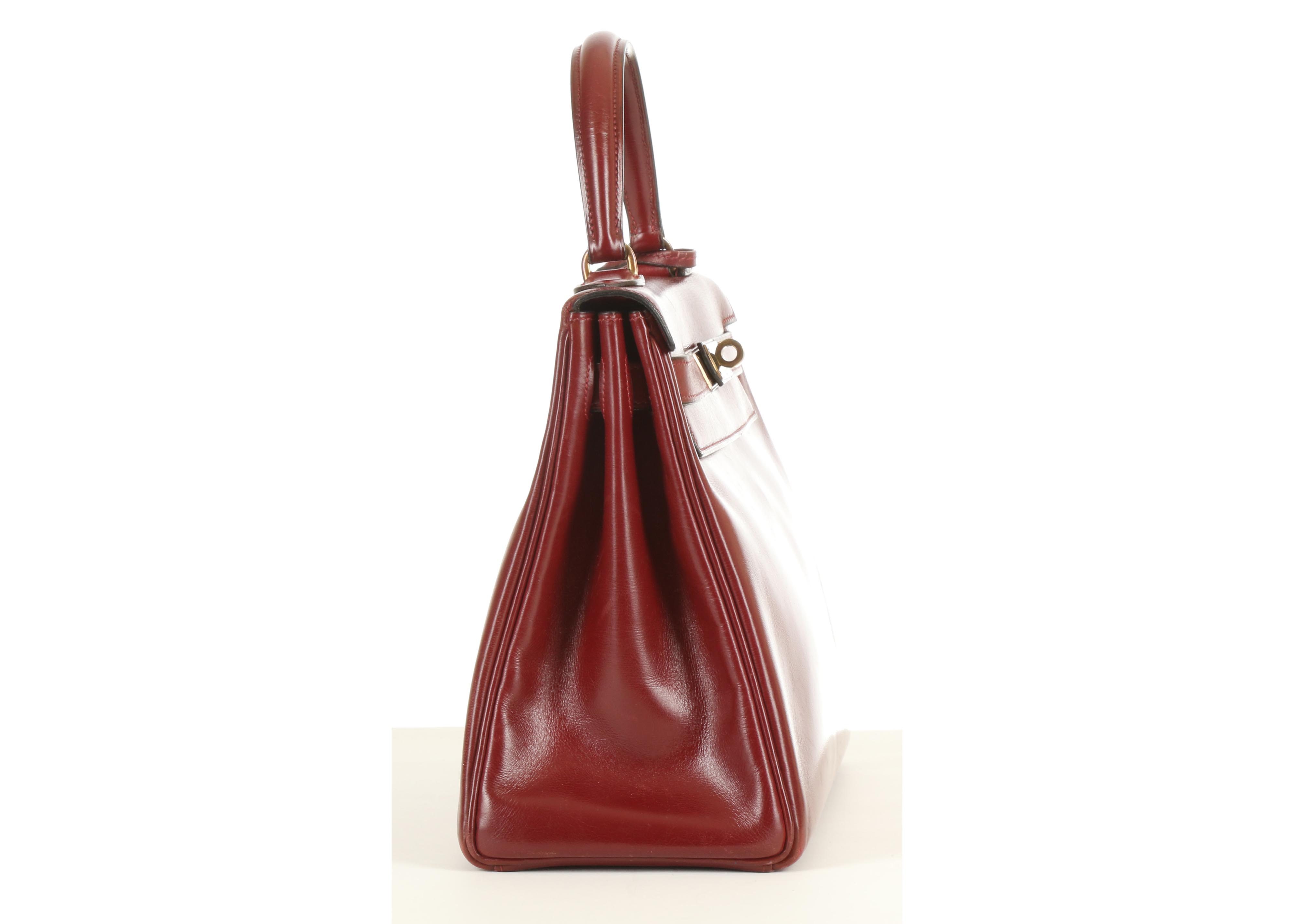 Lot 379 - Hermes Rouge H Kelly Retourne 28, c. 1970