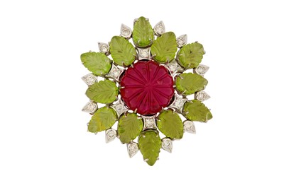 Lot 47 - A pink tourmaline, peridot and diamond pendant...