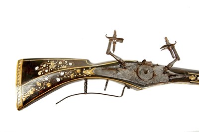 Lot 150 - A mid or late-17th century wheellock firearm,...