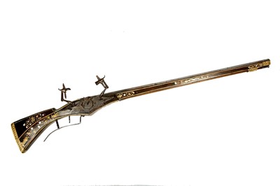 Lot 150 - A mid or late-17th century wheellock firearm,...