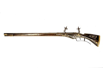 Lot 150 - A mid or late-17th century wheellock firearm,...