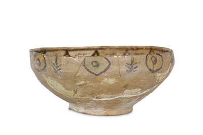 Lot 16 - A NISHAPUR BUFFWARE POTTERY BOWL Iran, 10th...