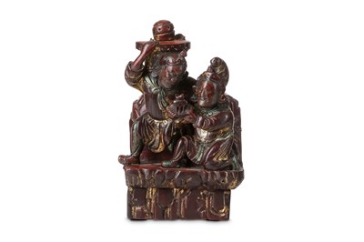 Lot 381 - A CHINESE GILT LACQUER FIGURAL GROUP. Qing...