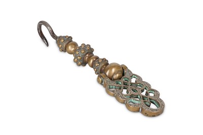 Lot 100a - A SILVER-INLAID BRASS HOOK Possibly Egypt or...