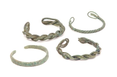 Lot 142 - FOUR MEDIEVAL BRONZE BANGLES Circa 9th – 13th...