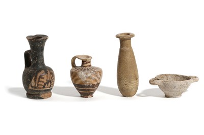 Lot 69 - A GROUP OF MINIATURE VESSELS Egyptian Late...