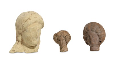 Lot 65 - THREE TERRACOTTA HEADS Circa 5th - 3rd Century...