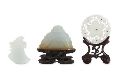 Lot 248 - THREE CHINESE JADE CARVINGS.  20th Century....