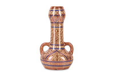 Lot 179 - AN HISPANO-MORESQUE COPPER-LUSTRE POTTERY VASE...