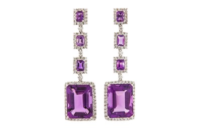 Lot 76 - A pair of amethyst and diamond pendent...