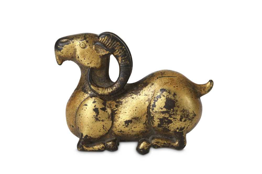 Lot 357 - A CHINESE GILT-BRONZE 'RAM' PAPERWEIGHT....