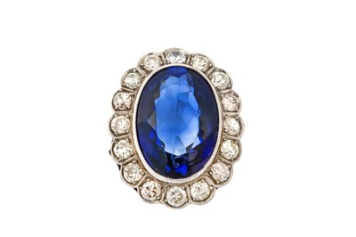 Lot 154 - A synthetic sapphire and diamond ring, circa...