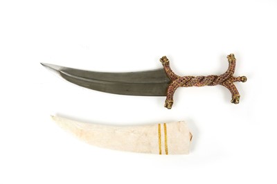 Lot 76 - An Indian chilanum dagger with yellow metal...