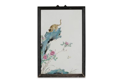 Lot 417 - A CHINESE FAMILLE ROSE PLAQUE. Late Qing...
