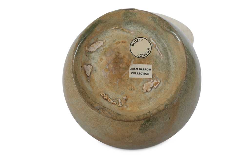 Lot 229 A CHINESE CELADONGLAZED 'LOTUS' JAR.